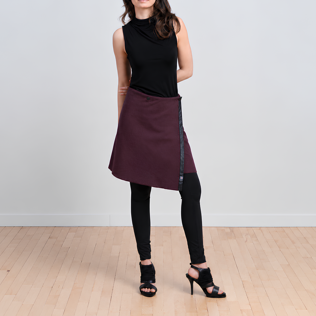 Front view of TUKUAN plum knee-length versatile wrap overskirt, available in sizes 4–14 and 14–18, designed and made in Quebec, Canada.