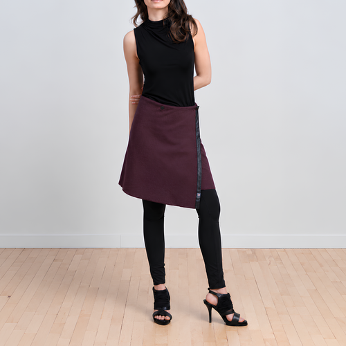 Front view of TUKUAN plum knee-length versatile wrap overskirt, available in sizes 4–14 and 14–18, designed and made in Quebec, Canada.