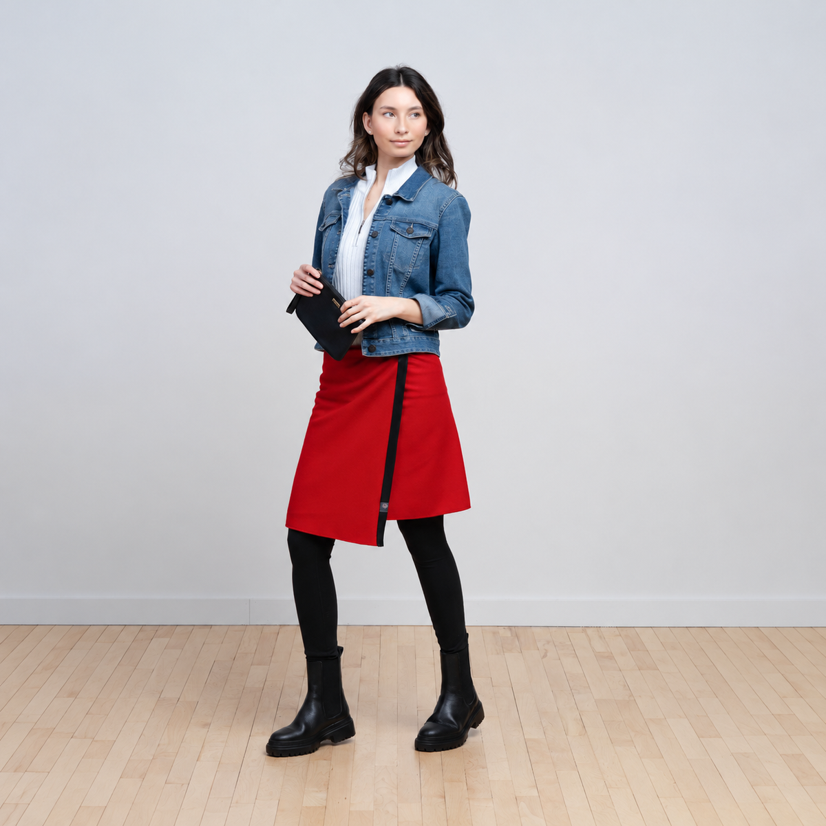 Red overskirt against a grey wall