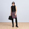 Fashion portrait in a plaid wrap skirt