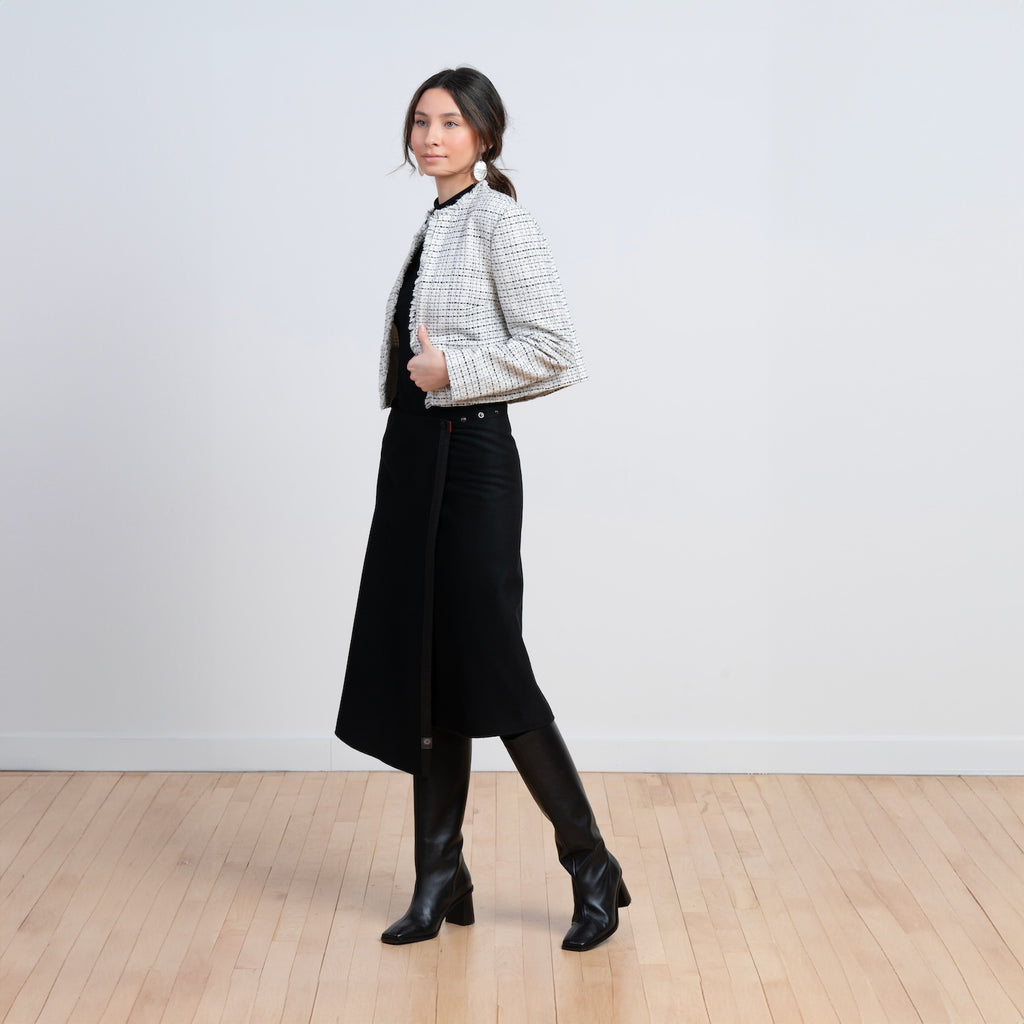TUKUAN black wool mid-calf versatile overskirt styled for everyday wear, one size 0–4, designed and made in Quebec, Canada.